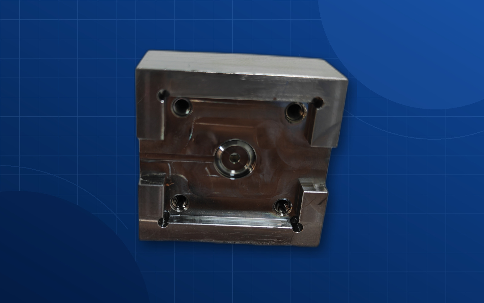 Deep blue background consumer electronics machined component